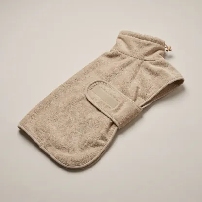 The Drying Coat in Sand 